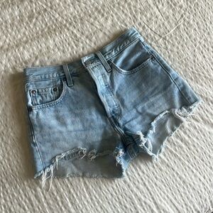 Levi’s 501 medium wash high waisted denim jean shorts